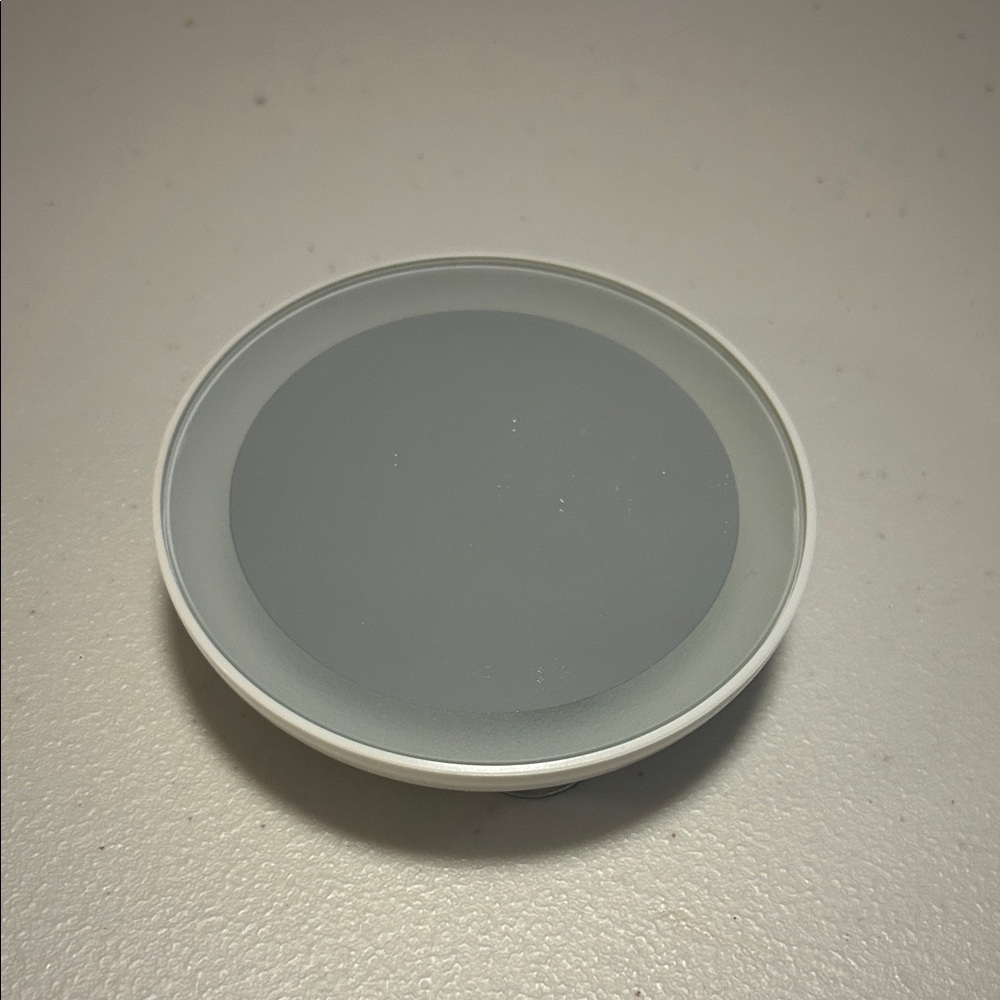 Small magnified mirror, light, suction cup